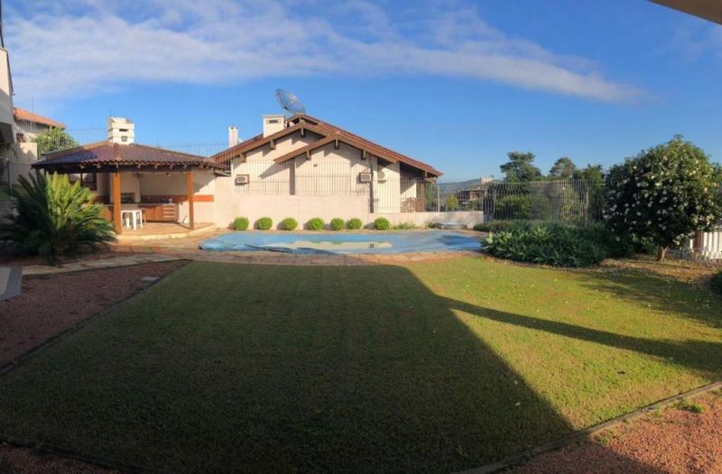 Casa com 4 quartos, 6 banheiros e 655m² à venda no bairro Morro do Leoncio, Taquara