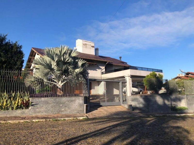Casa com 4 quartos, 6 banheiros e 655m² à venda no bairro Morro do Leoncio, Taquara