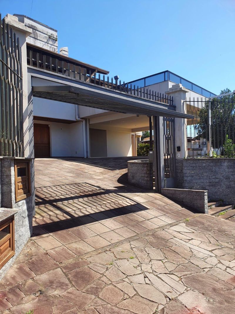Casa com 4 quartos, 6 banheiros e 655m² à venda no bairro Morro do Leoncio, Taquara