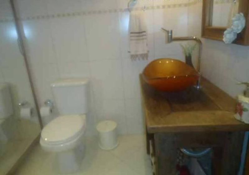 Apartamento com 1 quarto, 2 banheiros e 100m² à venda no bairro Centro, Taquara