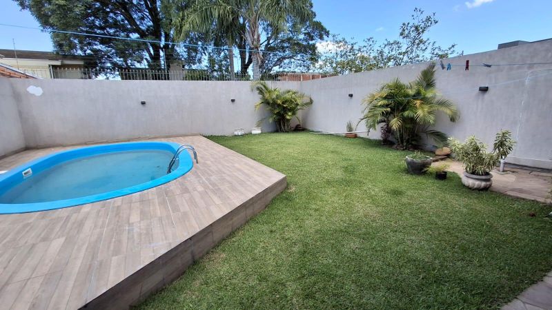 Casa com 3 quartos, 3 banheiros e 260m² à venda no bairro Jardim do Prado, Taquara