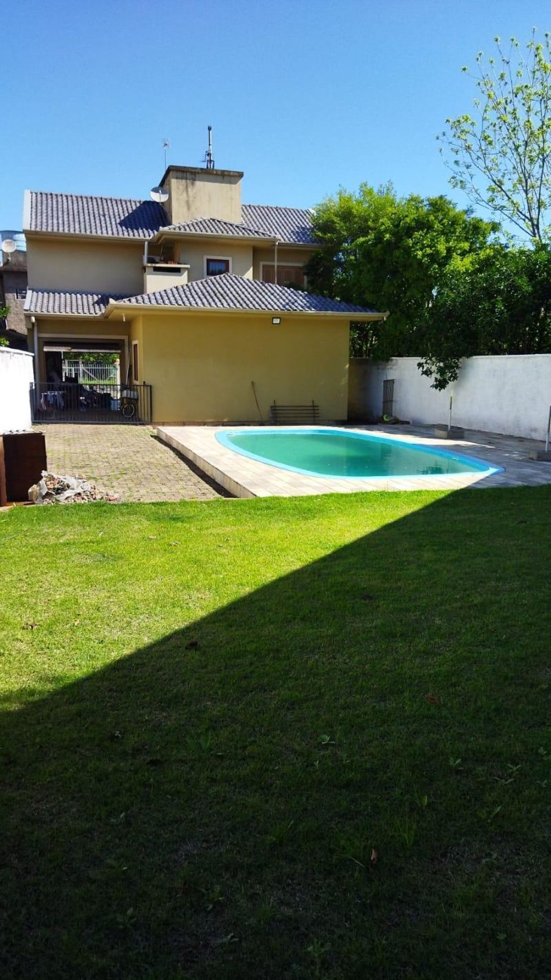 Casa com 4 quartos, 2 banheiros e 215m² à venda no bairro Jardim do Prado, Taquara