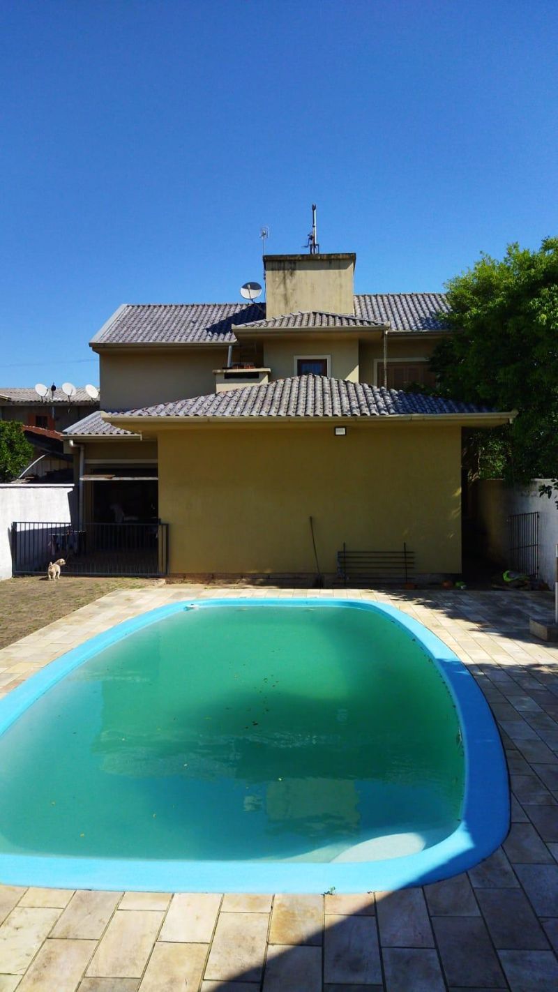 Casa com 4 quartos, 2 banheiros e 215m² à venda no bairro Jardim do Prado, Taquara