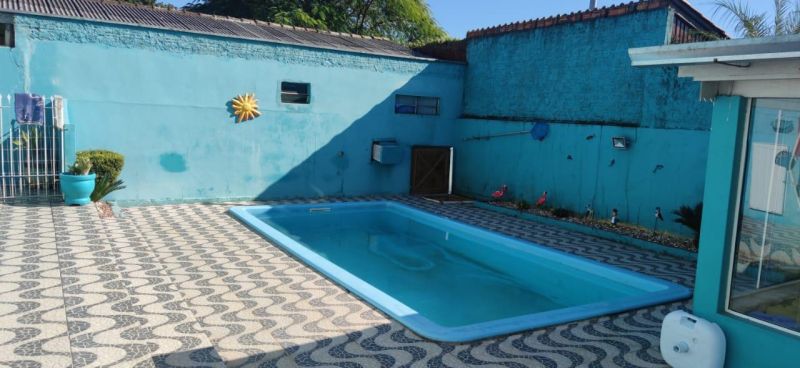 Casa com 3 quartos, 4 banheiros e 400m² à venda no bairro Jardim do Prado, Taquara