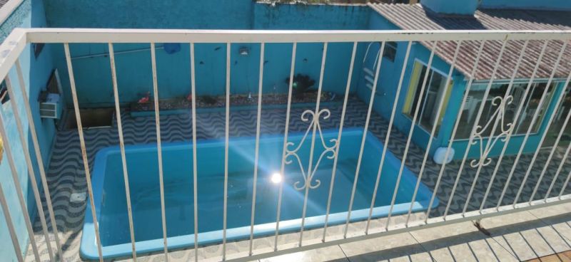 Casa com 3 quartos, 4 banheiros e 400m² à venda no bairro Jardim do Prado, Taquara
