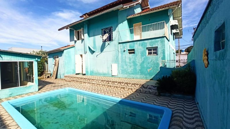 Casa com 3 quartos, 4 banheiros e 400m² à venda no bairro Jardim do Prado, Taquara