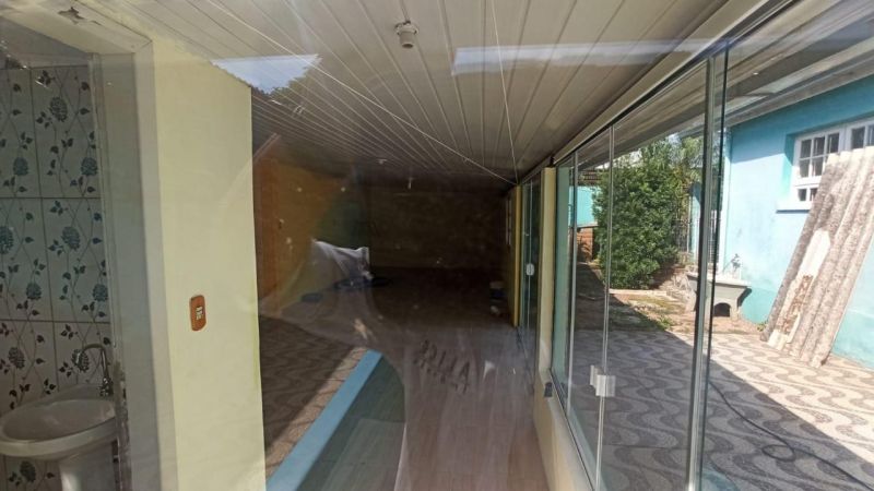 Casa com 3 quartos, 4 banheiros e 400m² à venda no bairro Jardim do Prado, Taquara