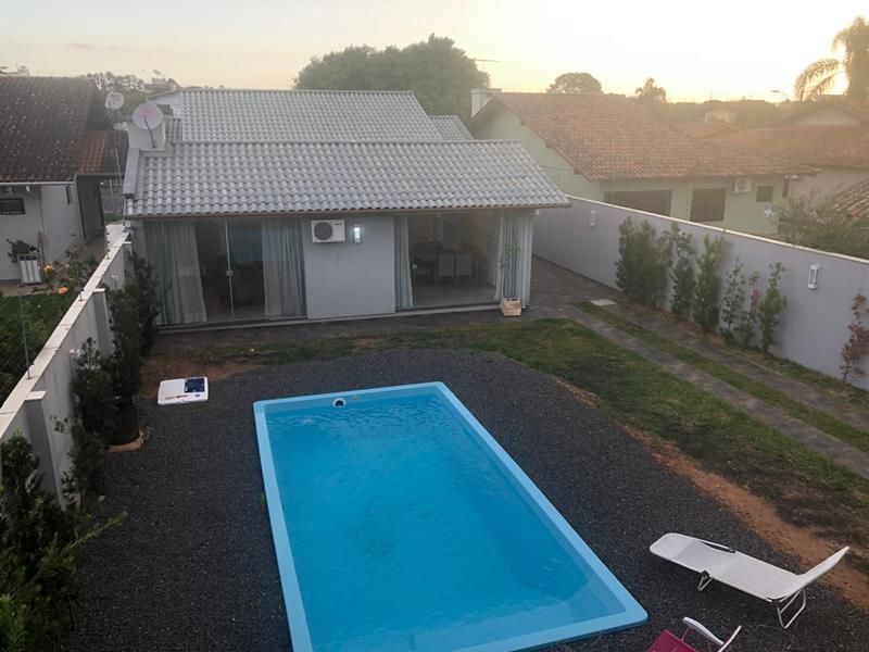 Casa com 3 quartos, 4 banheiros e 400m² à venda no bairro Jardim do Prado, Taquara