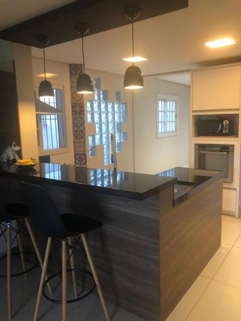 Casa com 3 quartos, 4 banheiros e 400m² à venda no bairro Jardim do Prado, Taquara