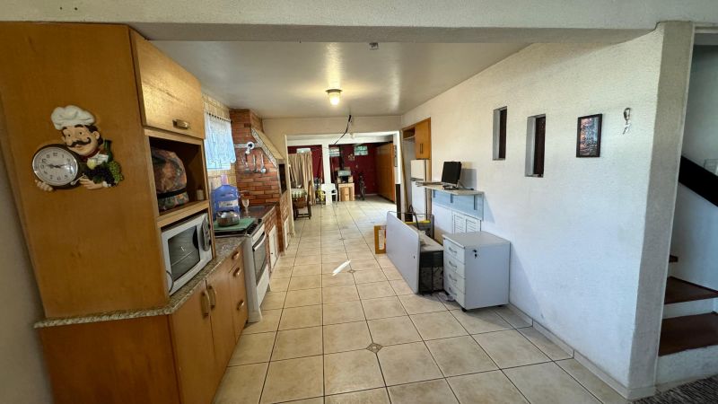 Casa com 4 quartos, 5 banheiros e 380m² à venda no bairro Recreio, Taquara