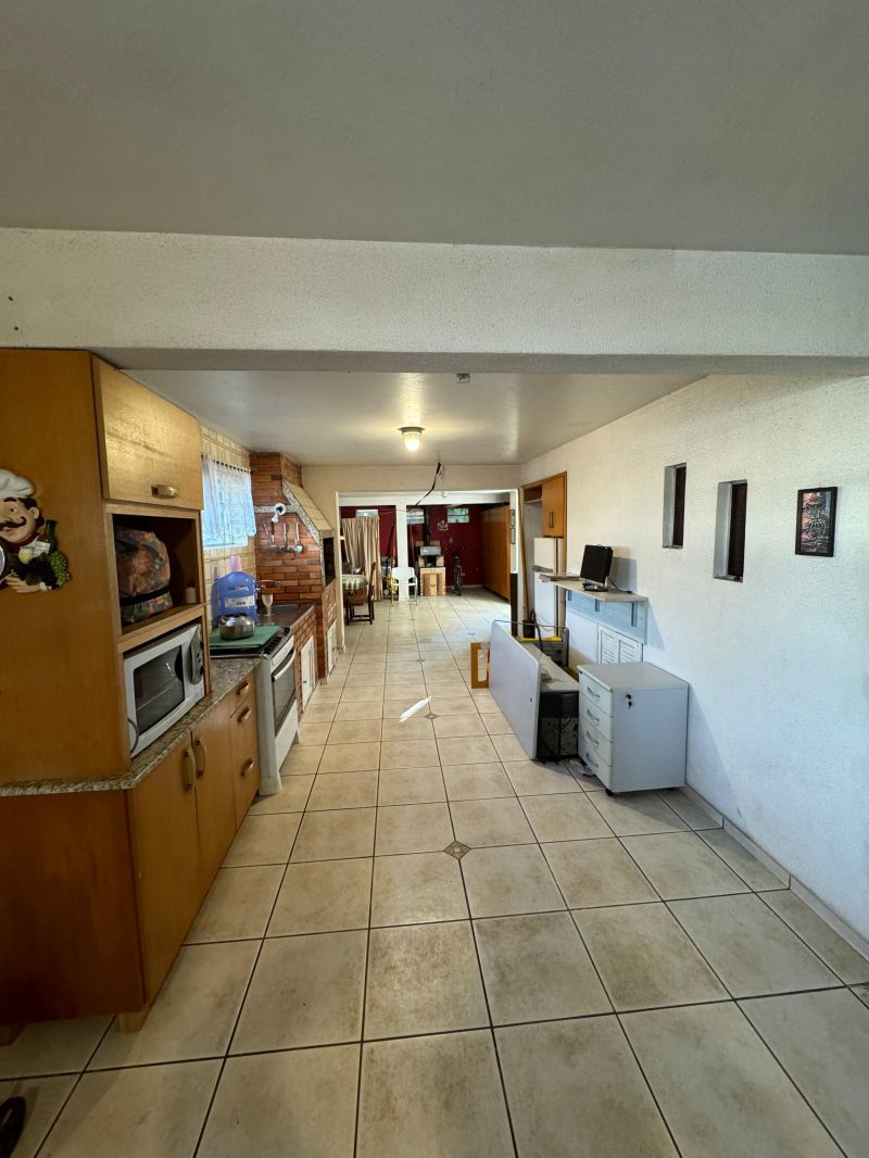 Casa com 4 quartos, 5 banheiros e 380m² à venda no bairro Recreio, Taquara