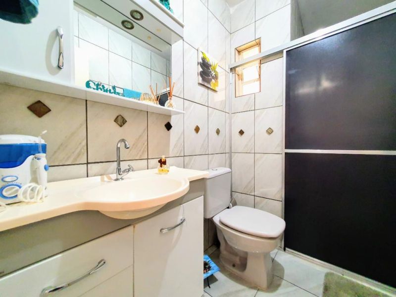 Casa com 3 quartos, 2 banheiros e 172m² à venda no bairro Santa Teresinha, Taquara