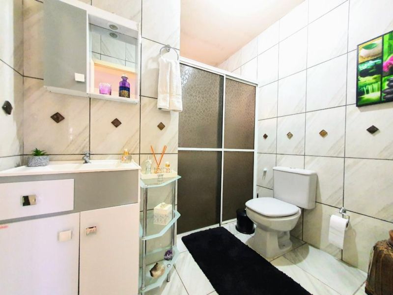 Casa com 3 quartos, 2 banheiros e 172m² à venda no bairro Santa Teresinha, Taquara