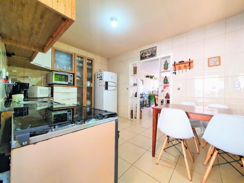 Casa com 3 quartos, 2 banheiros e 172m² à venda no bairro Santa Teresinha, Taquara