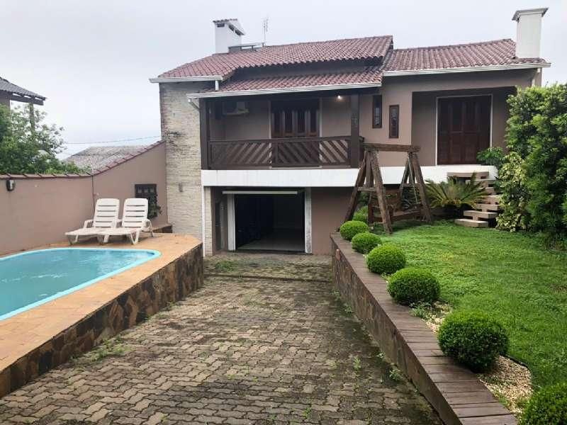 Casa com 3 quartos, 3 banheiros e 209m² à venda no bairro Santa Teresinha, Taquara