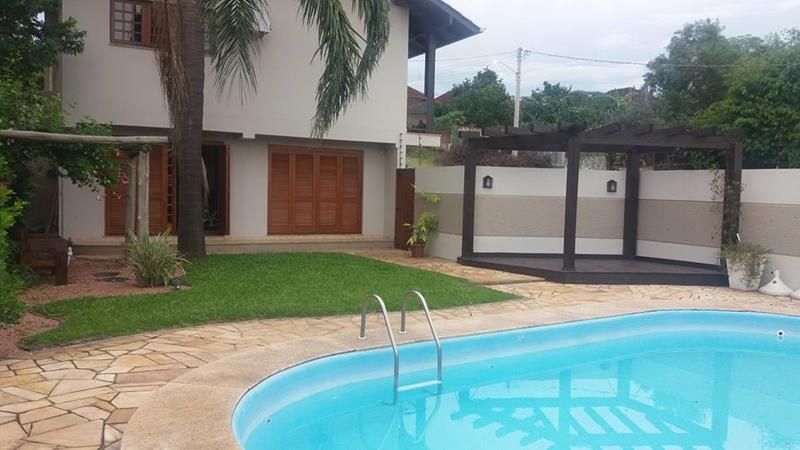 Casa com 4 quartos, 2 banheiros e 300m² à venda no bairro Santa Teresinha, Taquara