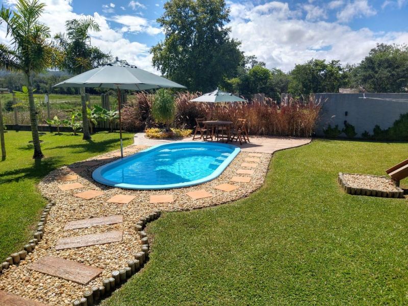 Casa com 5 banheiros e 250m² à venda no bairro Tucanos, Taquara
