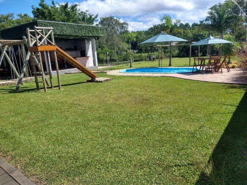 Casa com 5 banheiros e 250m² à venda no bairro Tucanos, Taquara