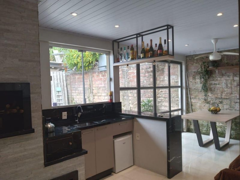 Casa com 3 quartos, 2 banheiros e 150m² à venda no bairro Ideal, Taquara