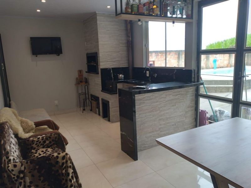 Casa com 3 quartos, 2 banheiros e 150m² à venda no bairro Ideal, Taquara