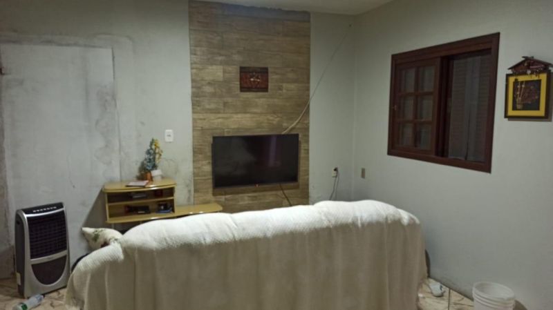 Casa com 3 quartos, 5 banheiros e 270m² à venda no bairro Empresa, Taquara