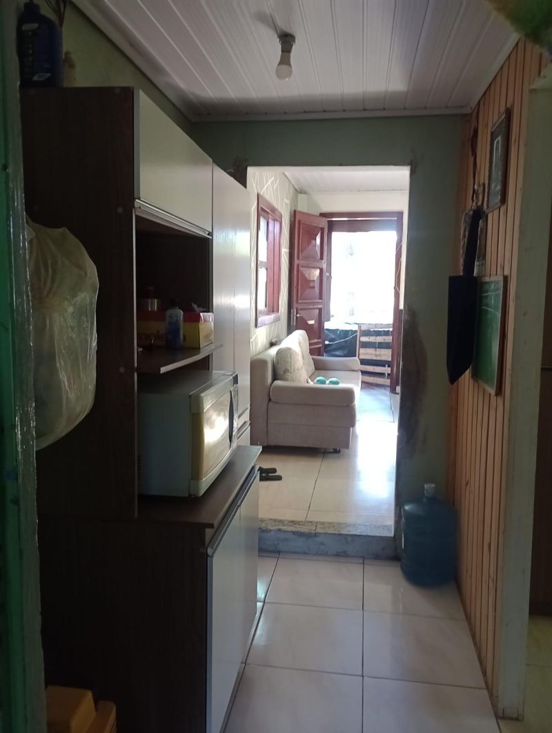 Casa com 4 quartos, 2 banheiros e 150m² à venda no bairro Empresa, Taquara