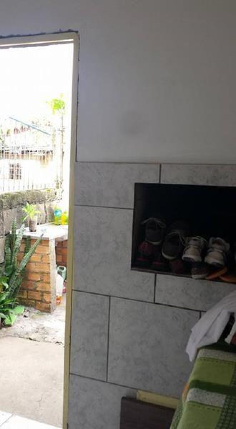 Casa com 4 quartos, 2 banheiros e 150m² à venda no bairro Empresa, Taquara