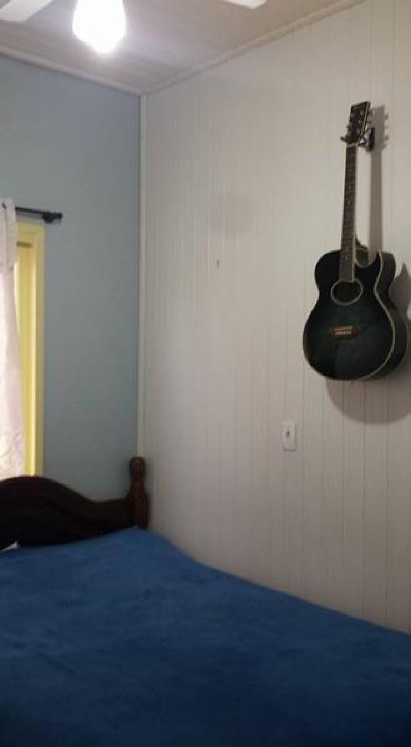 Casa com 4 quartos, 2 banheiros e 150m² à venda no bairro Empresa, Taquara