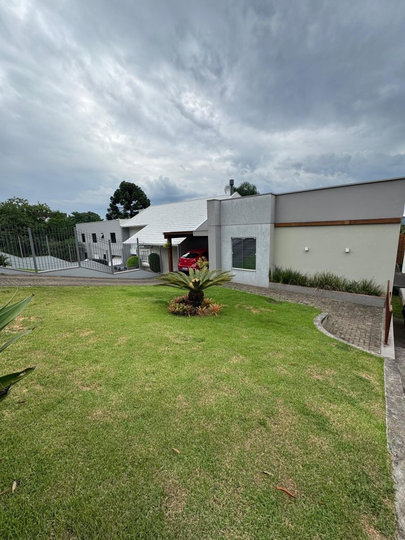 Casa com 2 quartos, 3 banheiros e 235m² à venda no bairro Morro do Leoncio, Taquara
