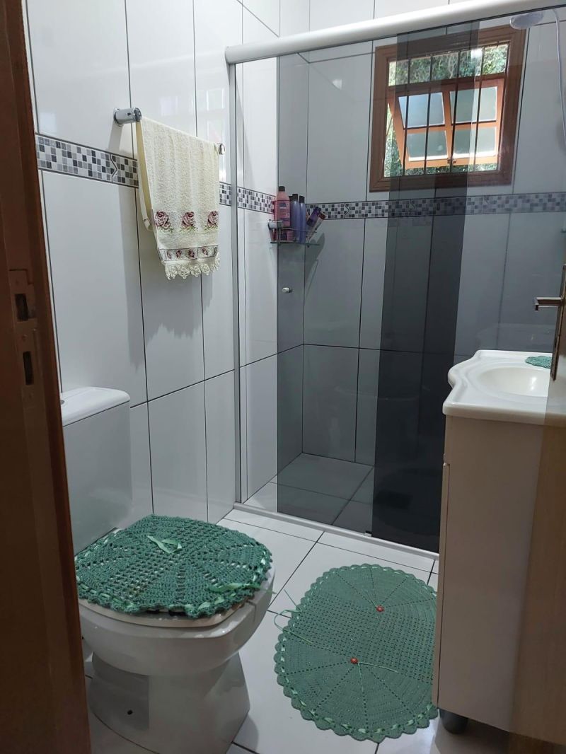 Casa com 4 quartos, 2 banheiros e 200m² à venda no bairro Morro do Leoncio, Taquara