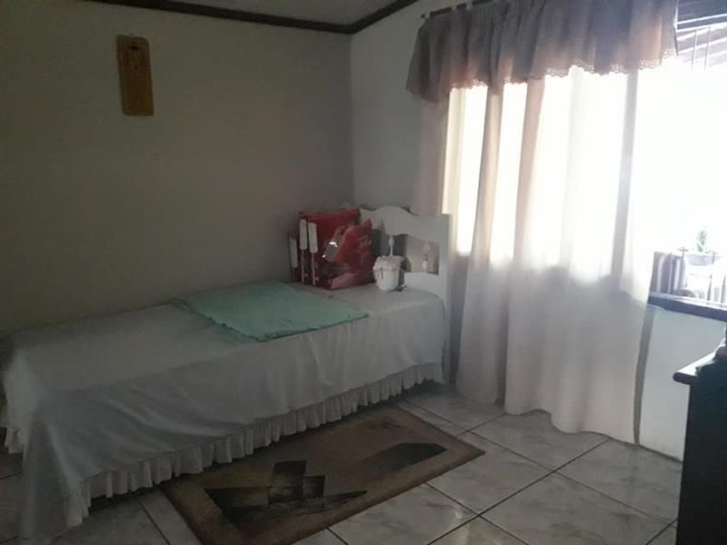 Casa com 3 quartos, 2 banheiros e 150m² à venda no bairro Morro do Leoncio, Taquara