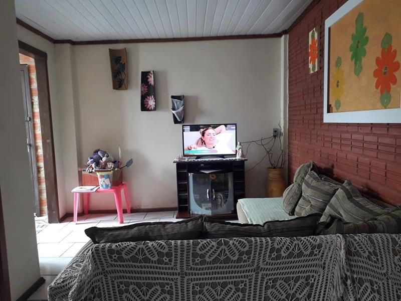 Casa com 3 quartos, 2 banheiros e 150m² à venda no bairro Morro do Leoncio, Taquara