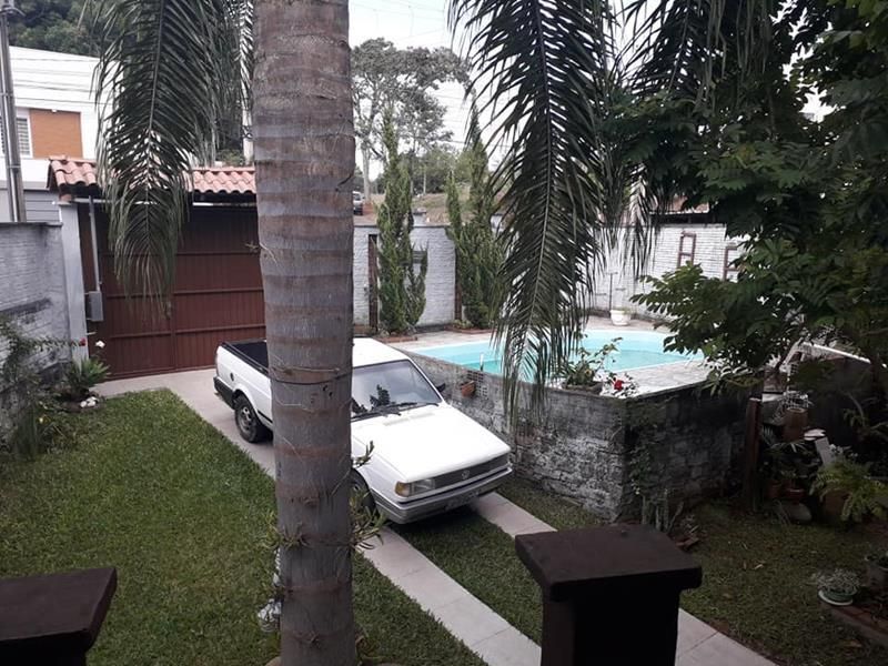 Casa com 3 quartos, 2 banheiros e 150m² à venda no bairro Morro do Leoncio, Taquara