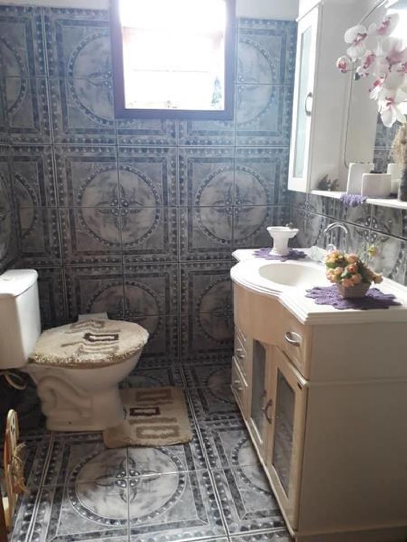 Casa com 3 quartos, 2 banheiros e 150m² à venda no bairro Morro do Leoncio, Taquara