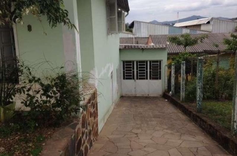 Casa com 3 quartos, 2 banheiros e 220m² à venda no bairro Recreio, Taquara