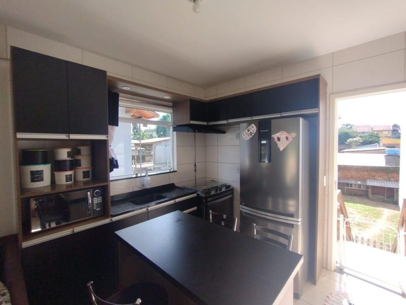 Casa com 3 quartos, 2 banheiros e 108m² à venda no bairro Mundo Novo, Taquara