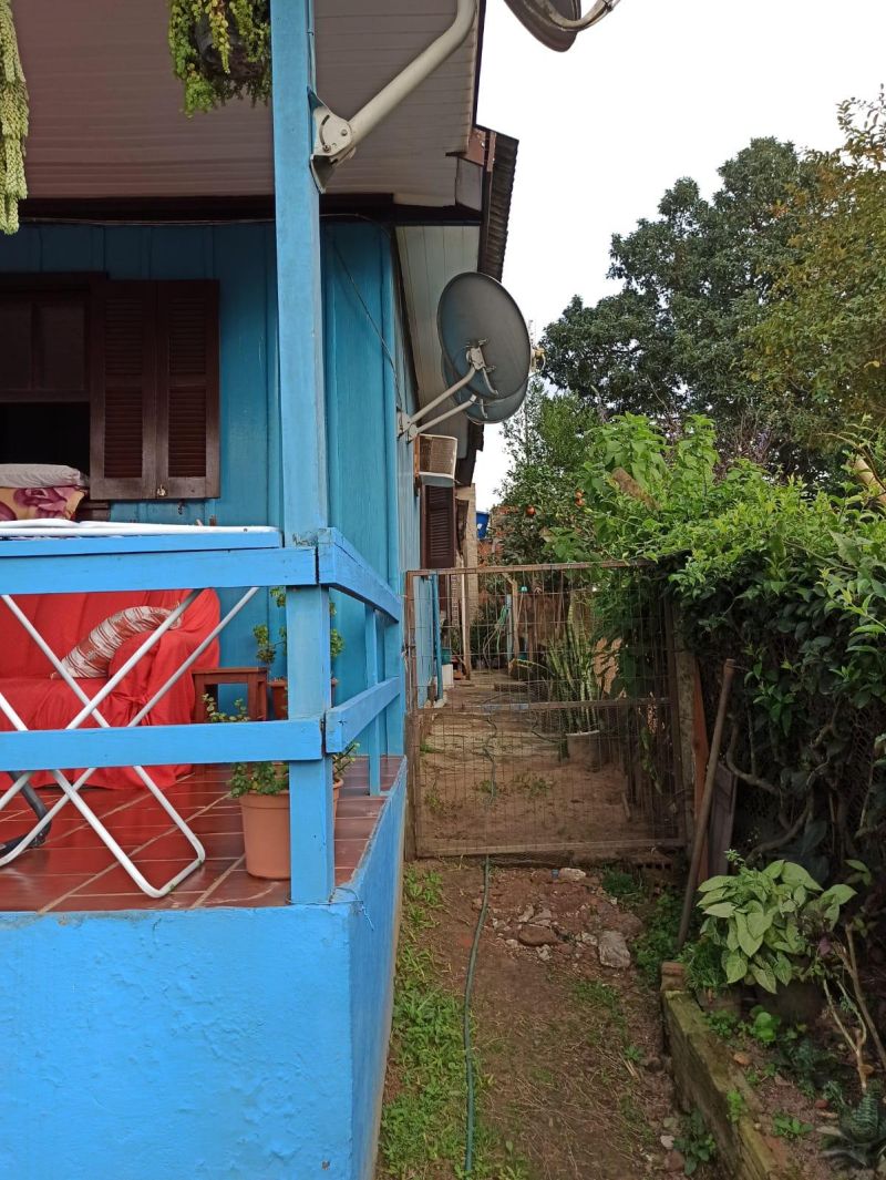 Casa com 4 quartos, 2 banheiros e 180m² à venda no bairro Mundo Novo, Taquara