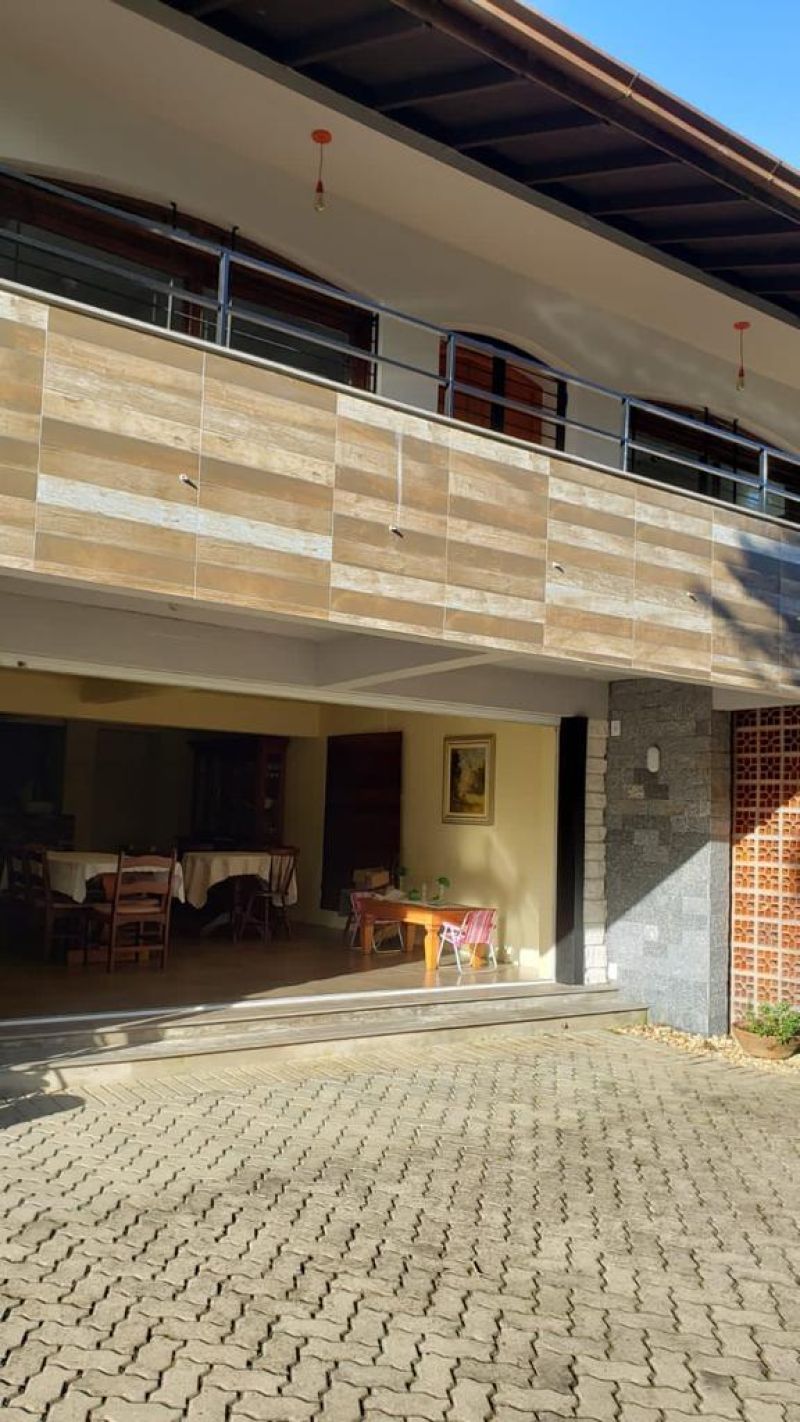 Casa com 4 quartos, 3 banheiros e 406m² à venda no bairro Sagrada Familia, Taquara