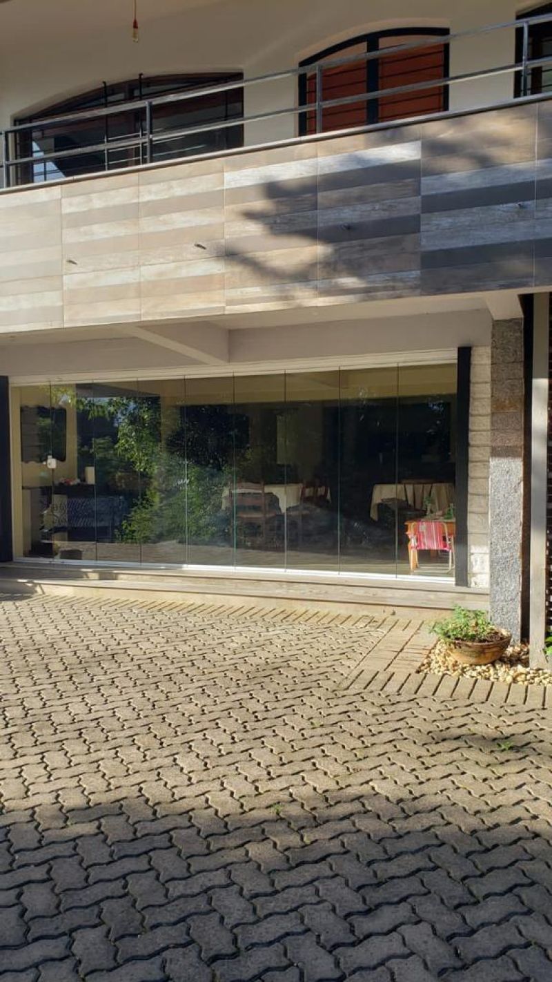 Casa com 4 quartos, 3 banheiros e 406m² à venda no bairro Sagrada Familia, Taquara