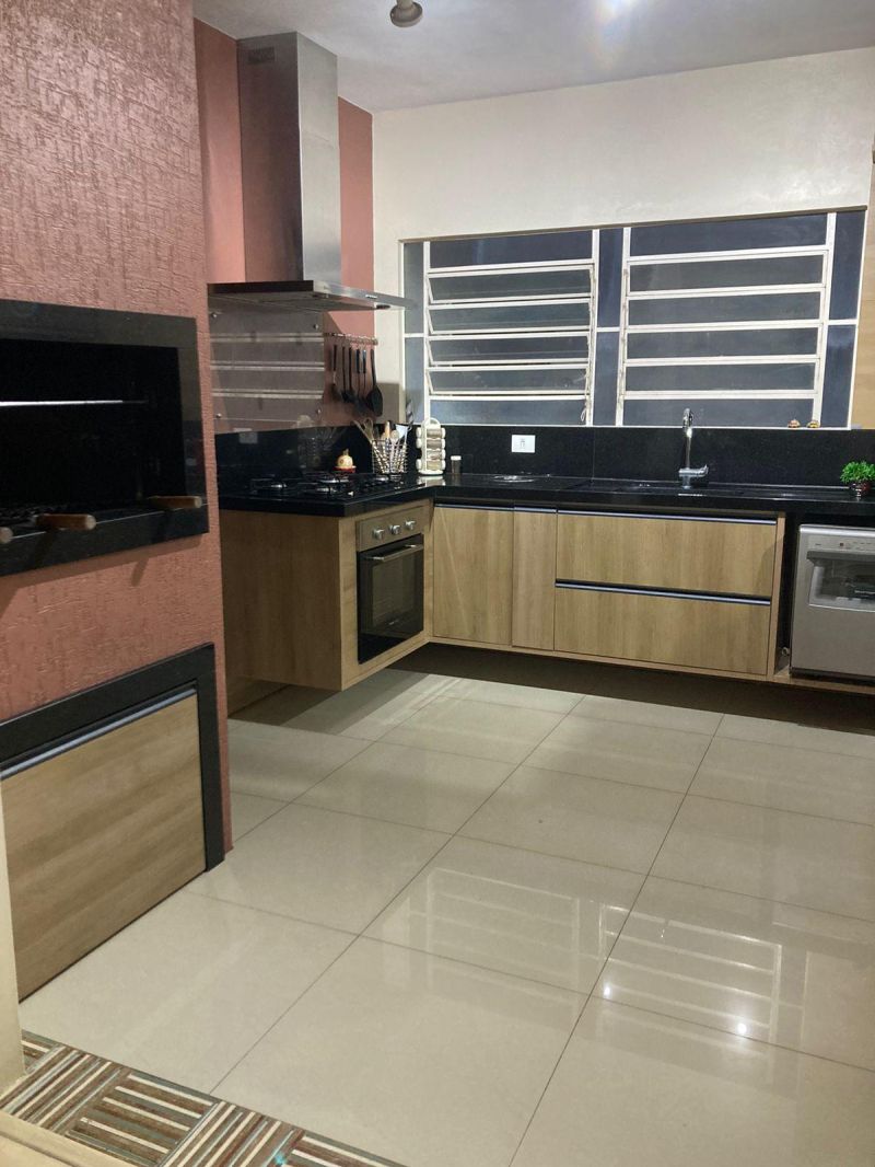 Casa com 4 quartos, 3 banheiros e 406m² à venda no bairro Sagrada Familia, Taquara