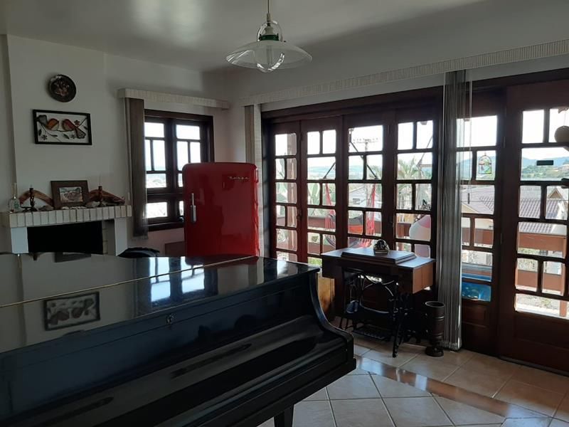 Casa com 3 quartos, 3 banheiros e 207m² à venda no bairro Sagrada Familia, Taquara