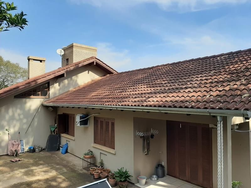 Casa com 3 quartos, 3 banheiros e 207m² à venda no bairro Sagrada Familia, Taquara
