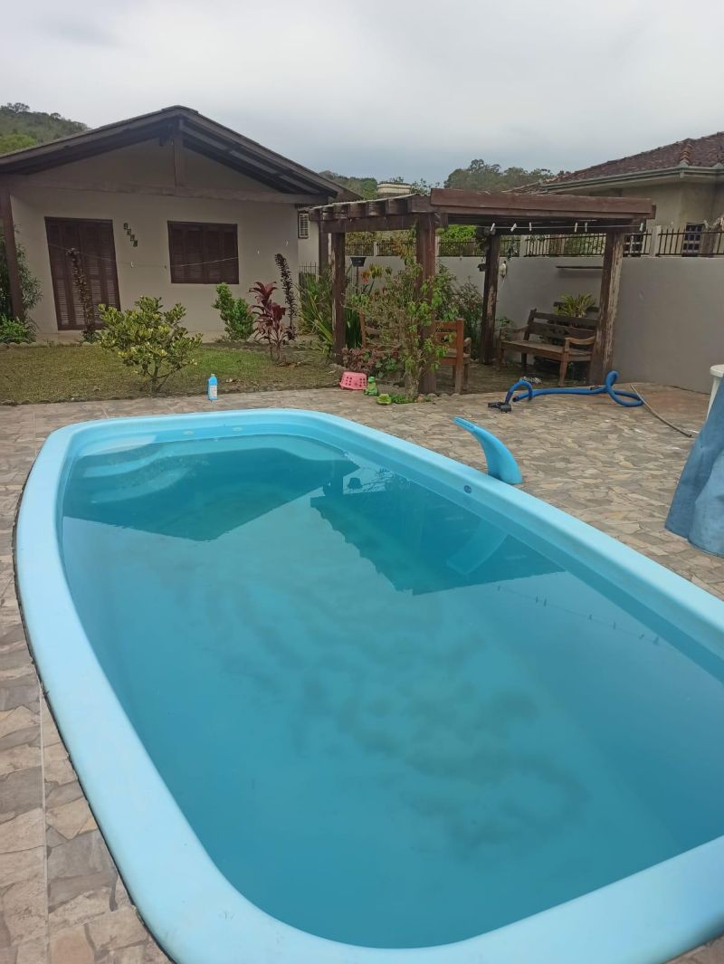 Casa com 2 quartos, 2 banheiros e 140m² à venda no bairro Santa Rosa, Taquara