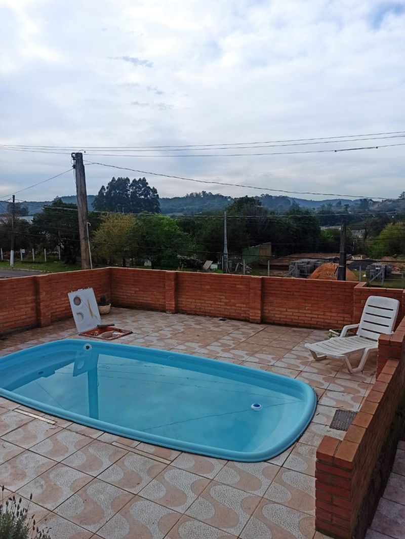Casa com 3 quartos, 2 banheiros e 120m² à venda no bairro Santa Rosa, Taquara