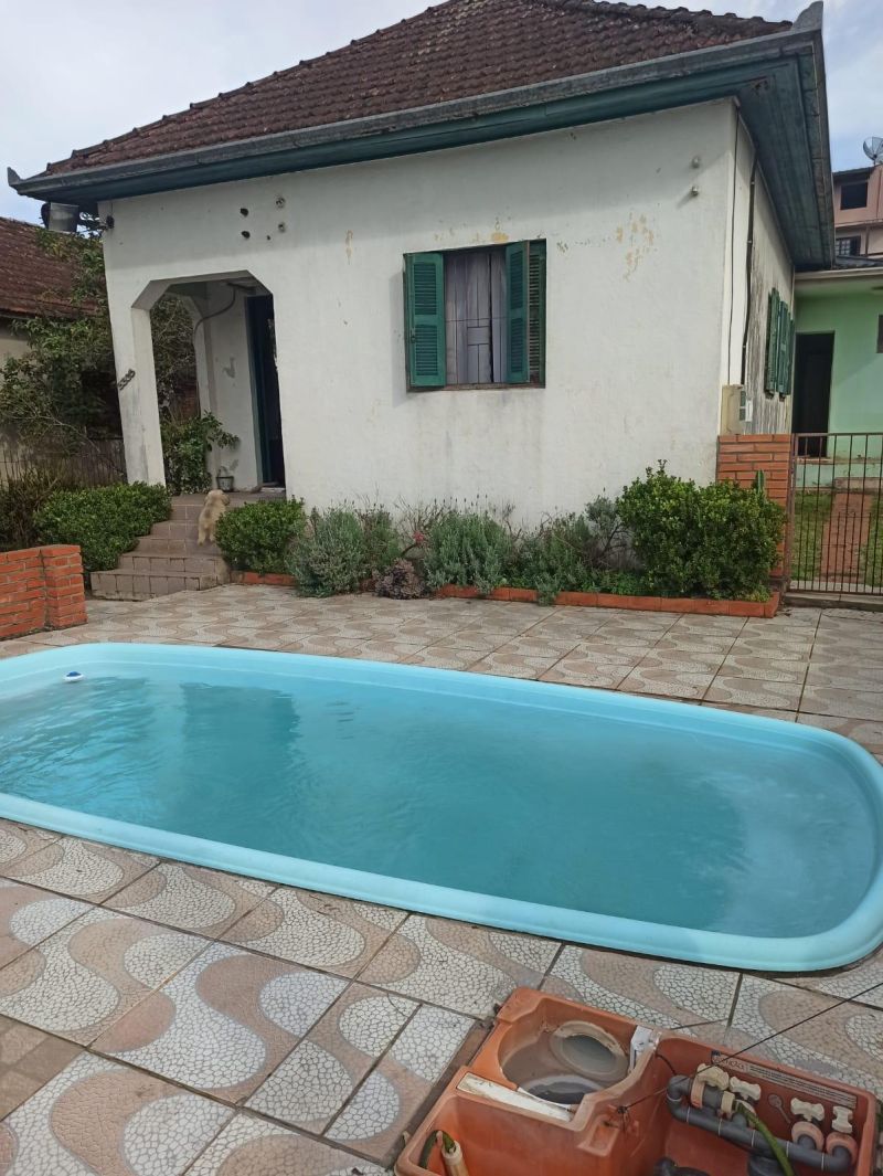 Casa com 3 quartos, 2 banheiros e 120m² à venda no bairro Santa Rosa, Taquara