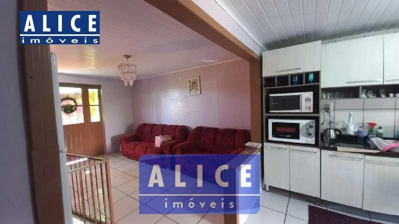Casa com 4 quartos e 2 banheiros à venda no bairro Centro, Taquara