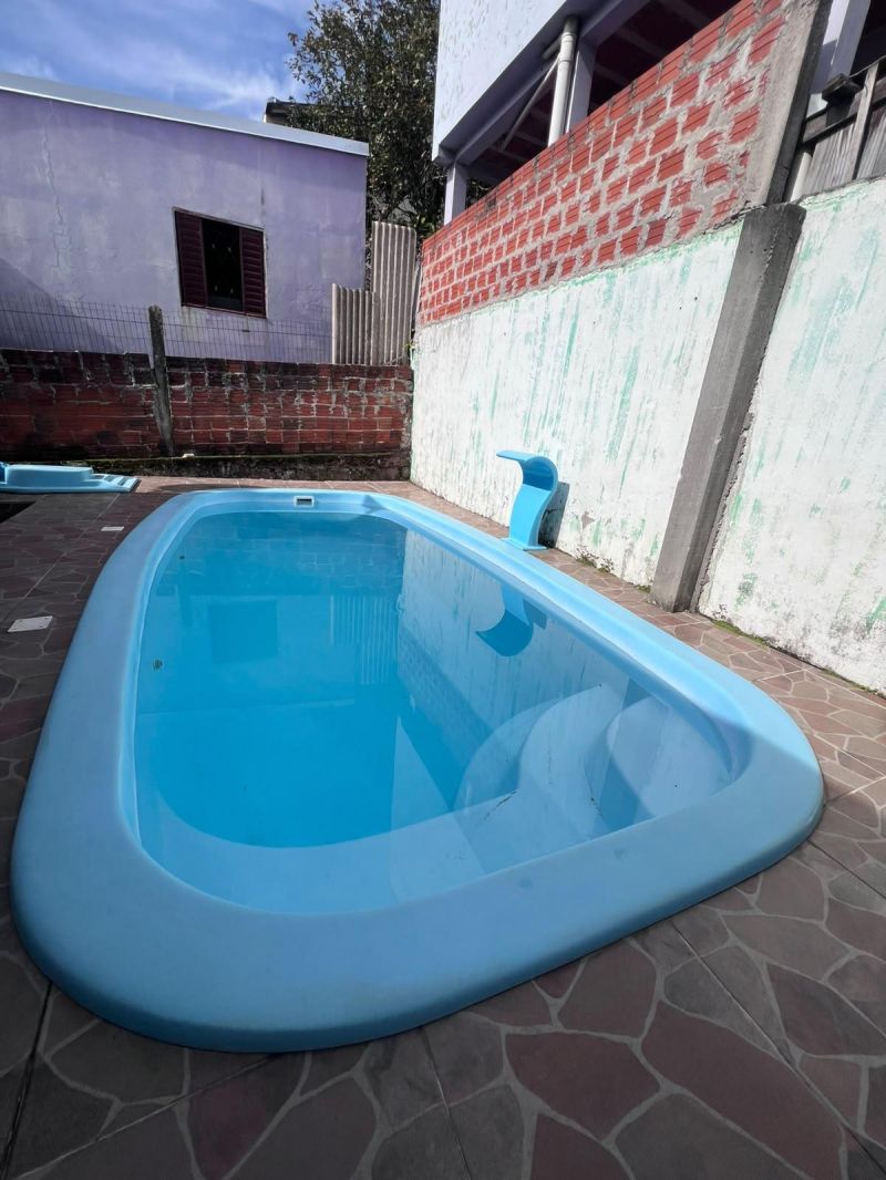 Taquara: Sua Casa com Piscina Espera por Você!