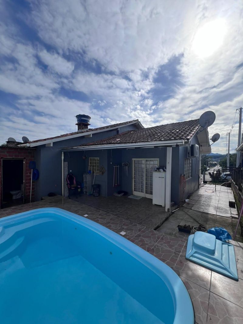 Taquara: Sua Casa com Piscina Espera por Você!