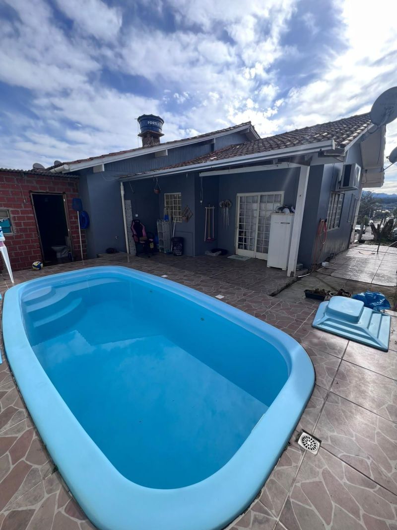Taquara: Sua Casa com Piscina Espera por Você!
