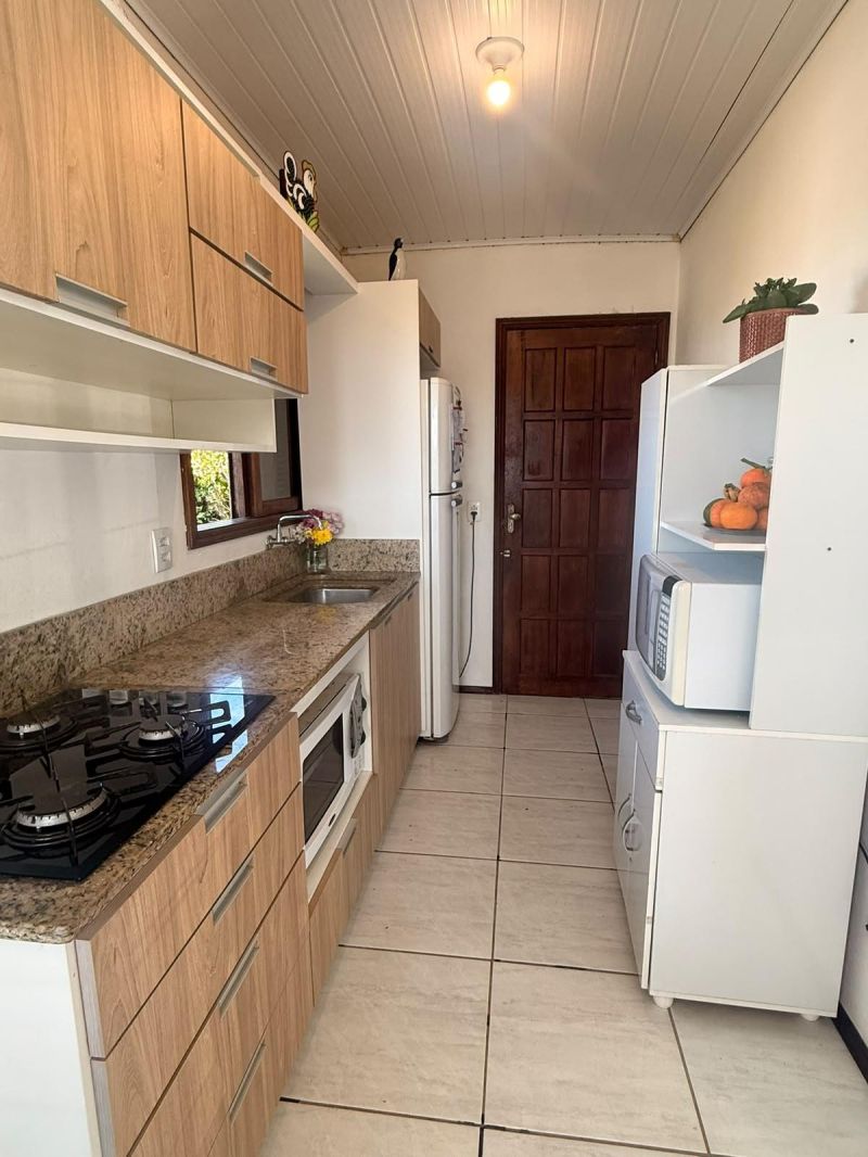 Taquara: Casa com Vista Deslumbrante em Área Residencial Alta